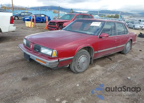 1989 Oldsmobile Delta 88 Royale z USA, uszkodzony, nr VIN 1G3HN54C3KW314036
